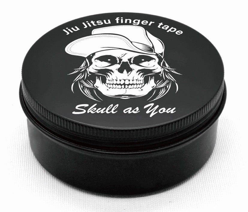 BJJ Finger Tape by Skull As You in black storage container with skull logo