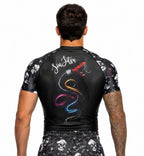Back view of Skull As You Skin n Bones Black short sleeve BJJ rash guard worn during No Gi training